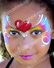 Child Face Painted with decorative heart