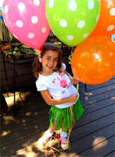 Happy Child with Balloons