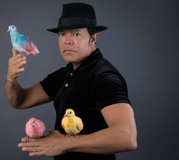 Magician with birds