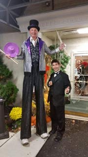 Stilt Walker with Magician at Party